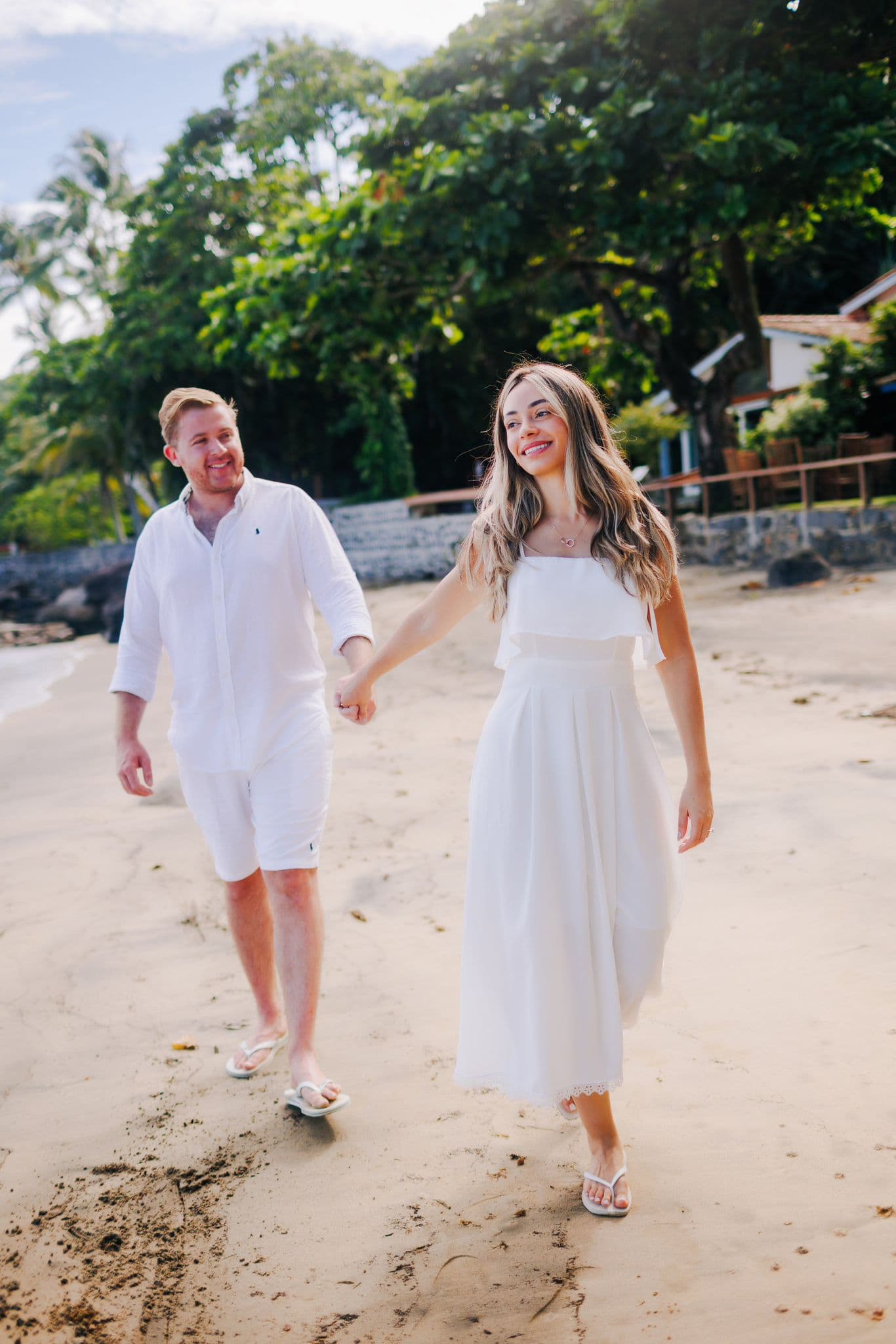 Bruna and Chris walking and smiling